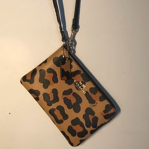 COACH cheetah print wristlet with gold detailing